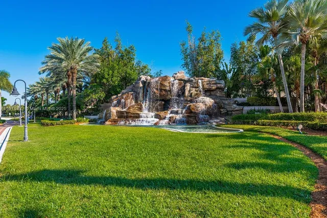 a view of an outdoor space with swimming pool
