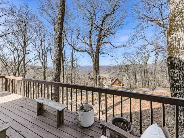 a view of a two chairs in the deck