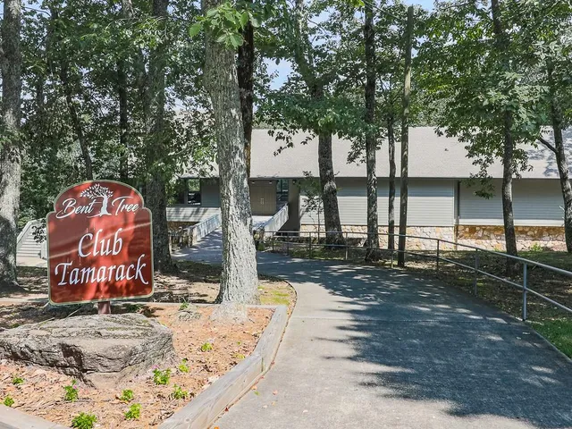 a view of a lake with a yard