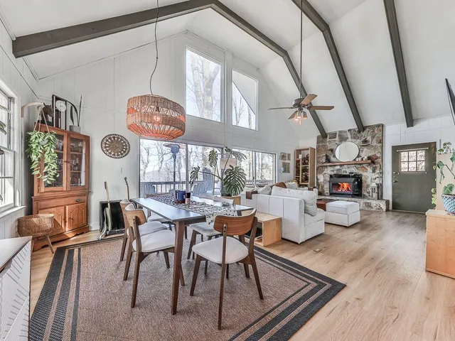 a living room with furniture and a table