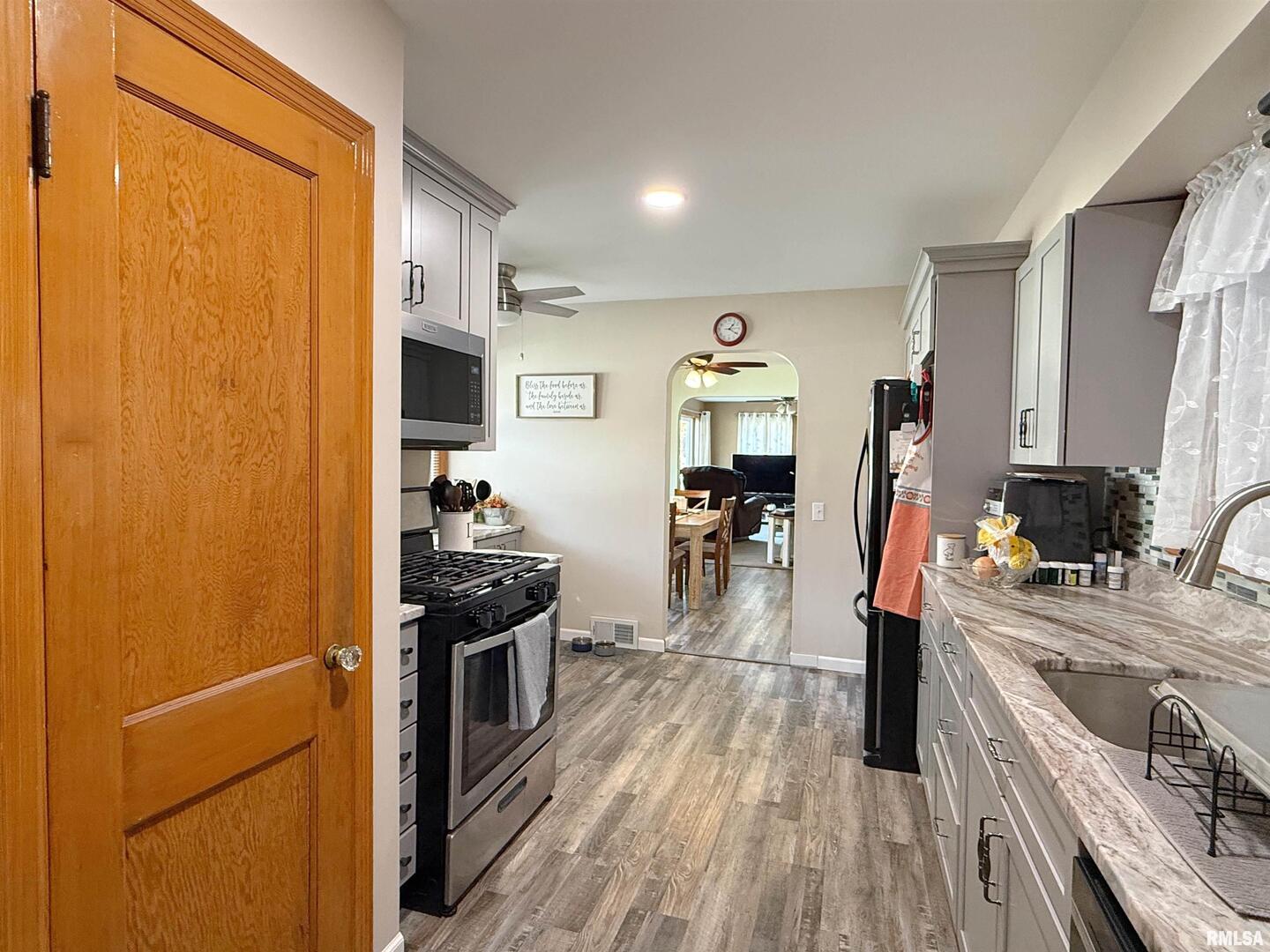 640 32nd Avenue Moline, IL 61265 - Photo 16 of 37 a kitchen with a sink appliances and cabinets