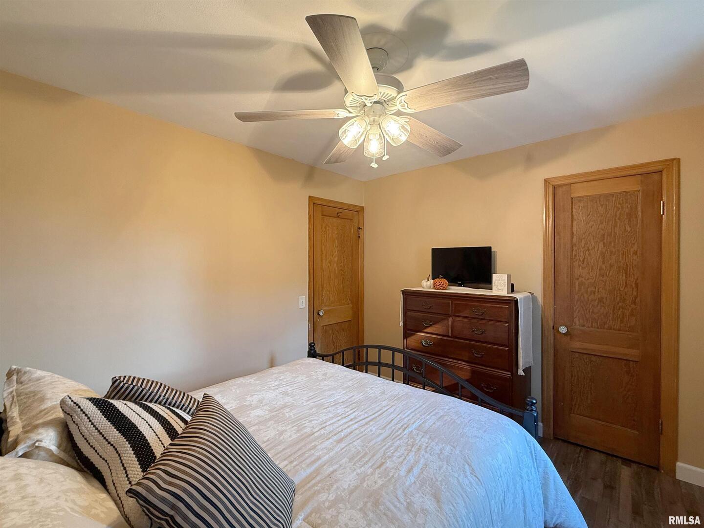 640 32nd Avenue Moline, IL 61265 - Photo 18 of 37 a bedroom with a bed and a tv