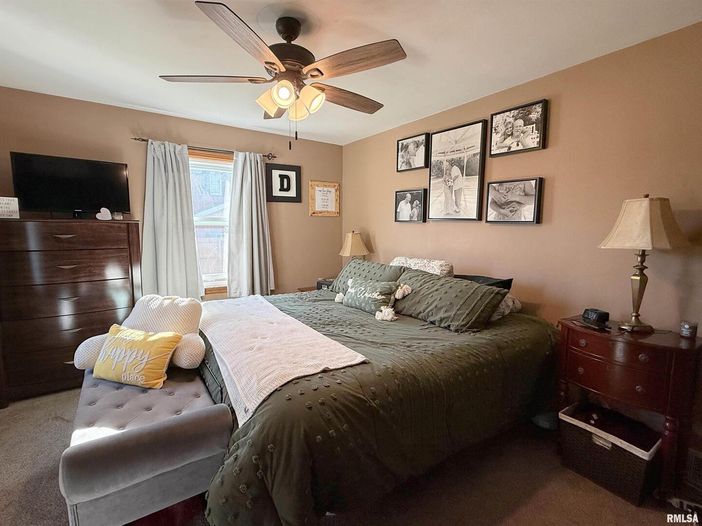 640 32nd Avenue Moline, IL 61265 - Photo 22 of 37 a bedroom with a bed and wooden floor