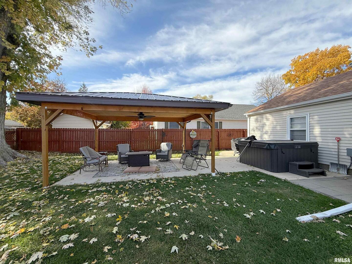 640 32nd Avenue Moline, IL 61265 - Photo 33 of 37 a view of a house with backyard porch and sitting area