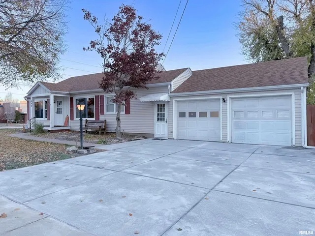 front view of a house with a street