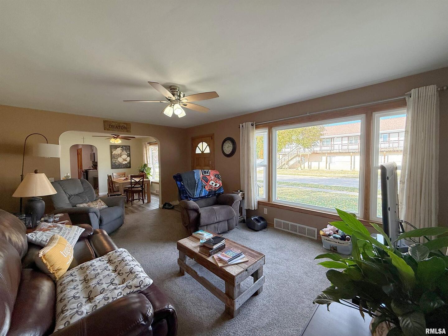 640 32nd Avenue Moline, IL 61265 - Photo 9 of 37 a living room with furniture and a large window