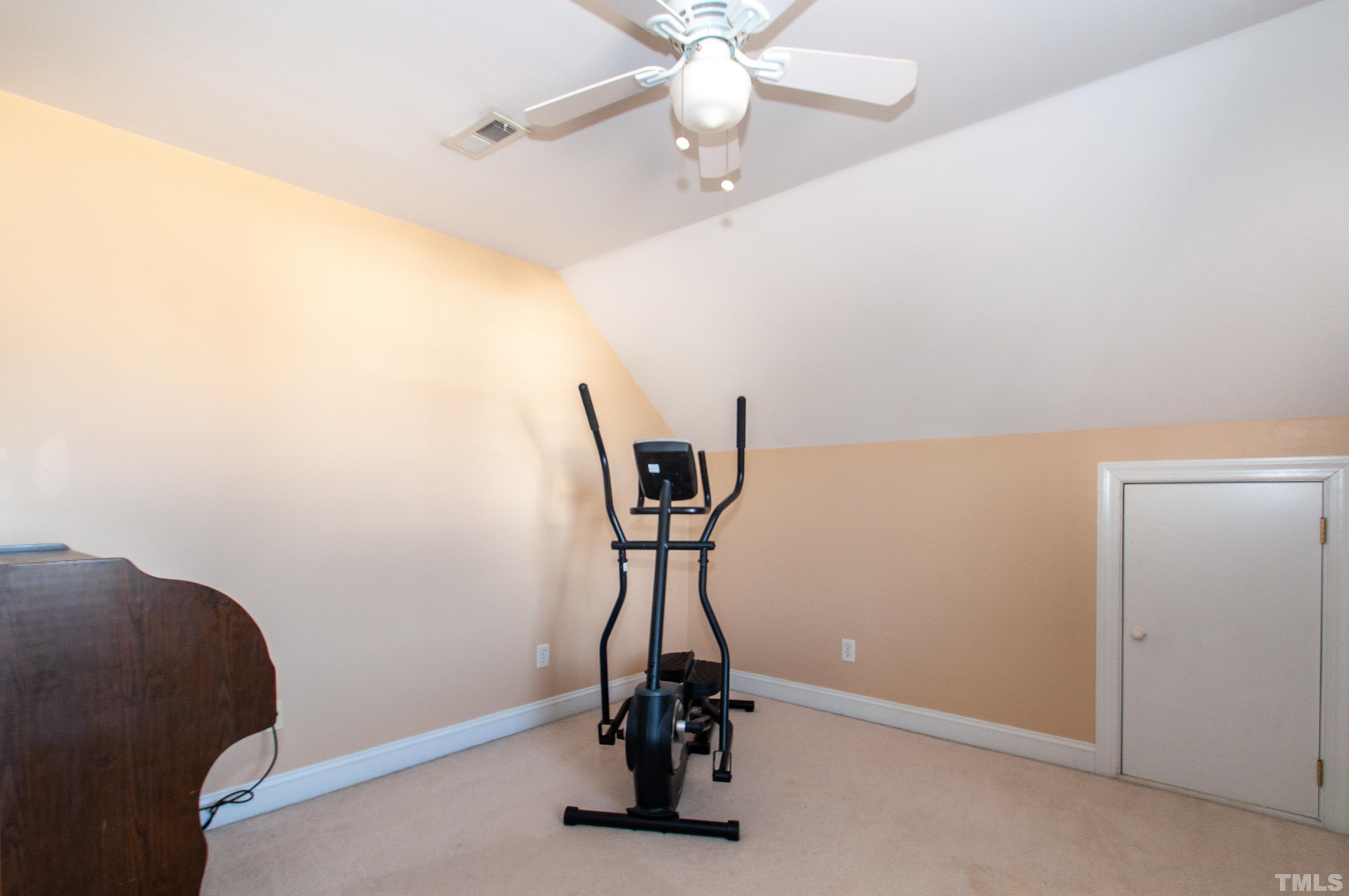 5012 Contender Drive Raleigh, NC 27603 - Photo 16 of 27 a view of a room with gym equipment