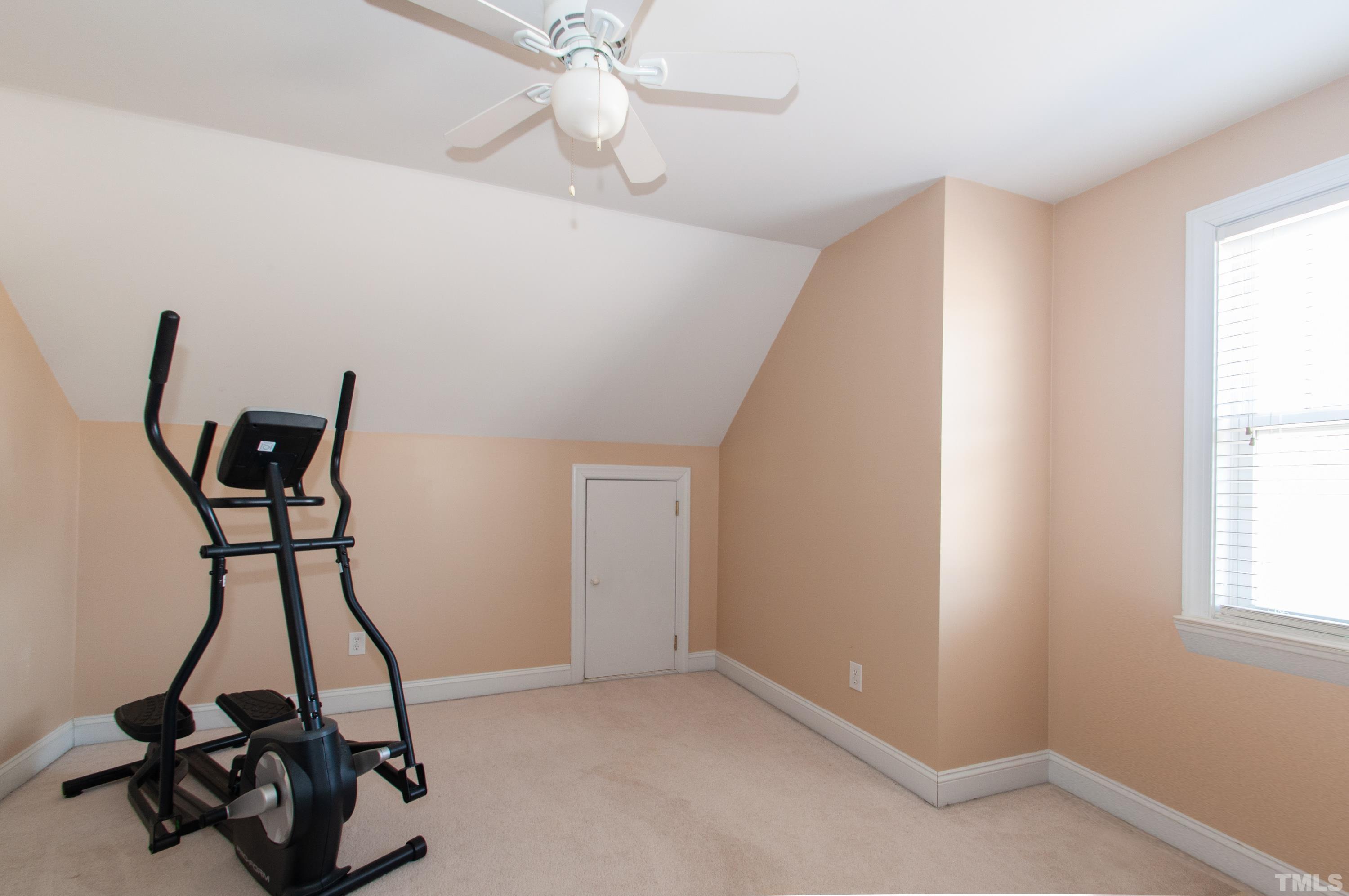 5012 Contender Drive Raleigh, NC 27603 - Photo 17 of 27 a view of a room with gym equipment