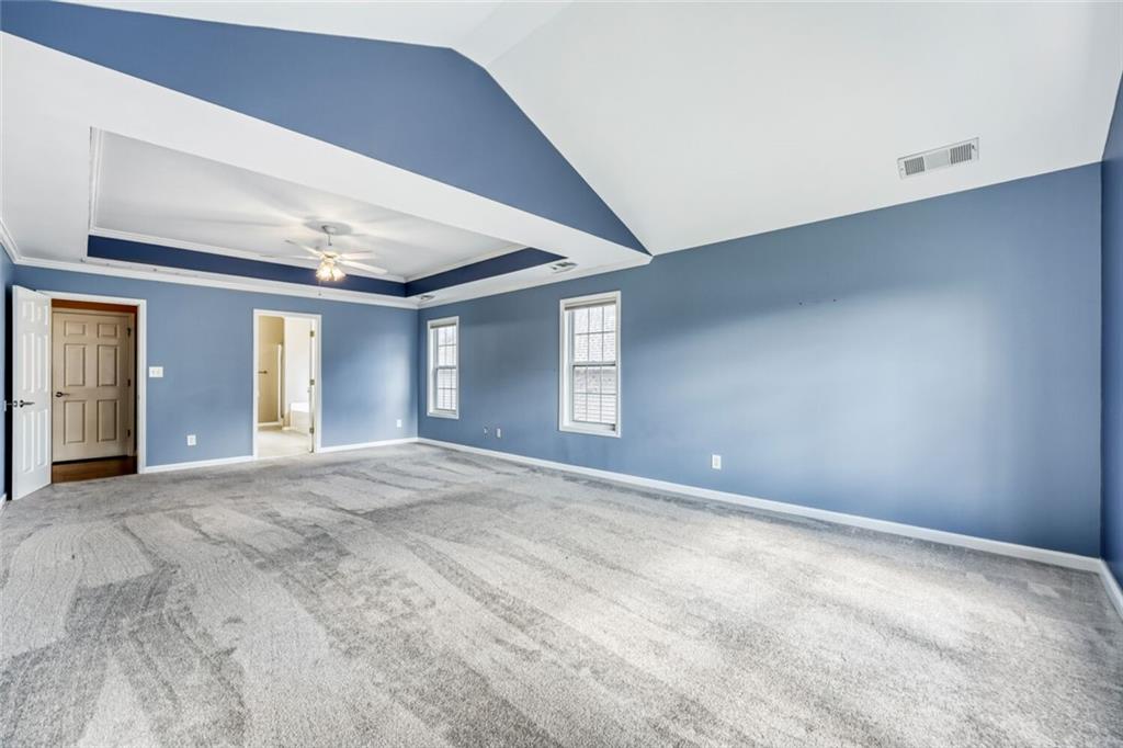 2531 Apalachee Run Way Dacula, GA 30019 - Photo 17 of 29 a view of an empty room with window