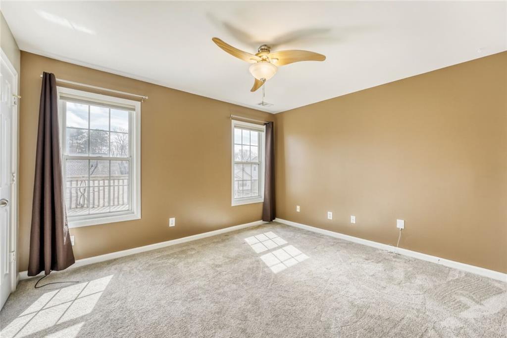2531 Apalachee Run Way Dacula, GA 30019 - Photo 21 of 29 a view of an empty room with a window