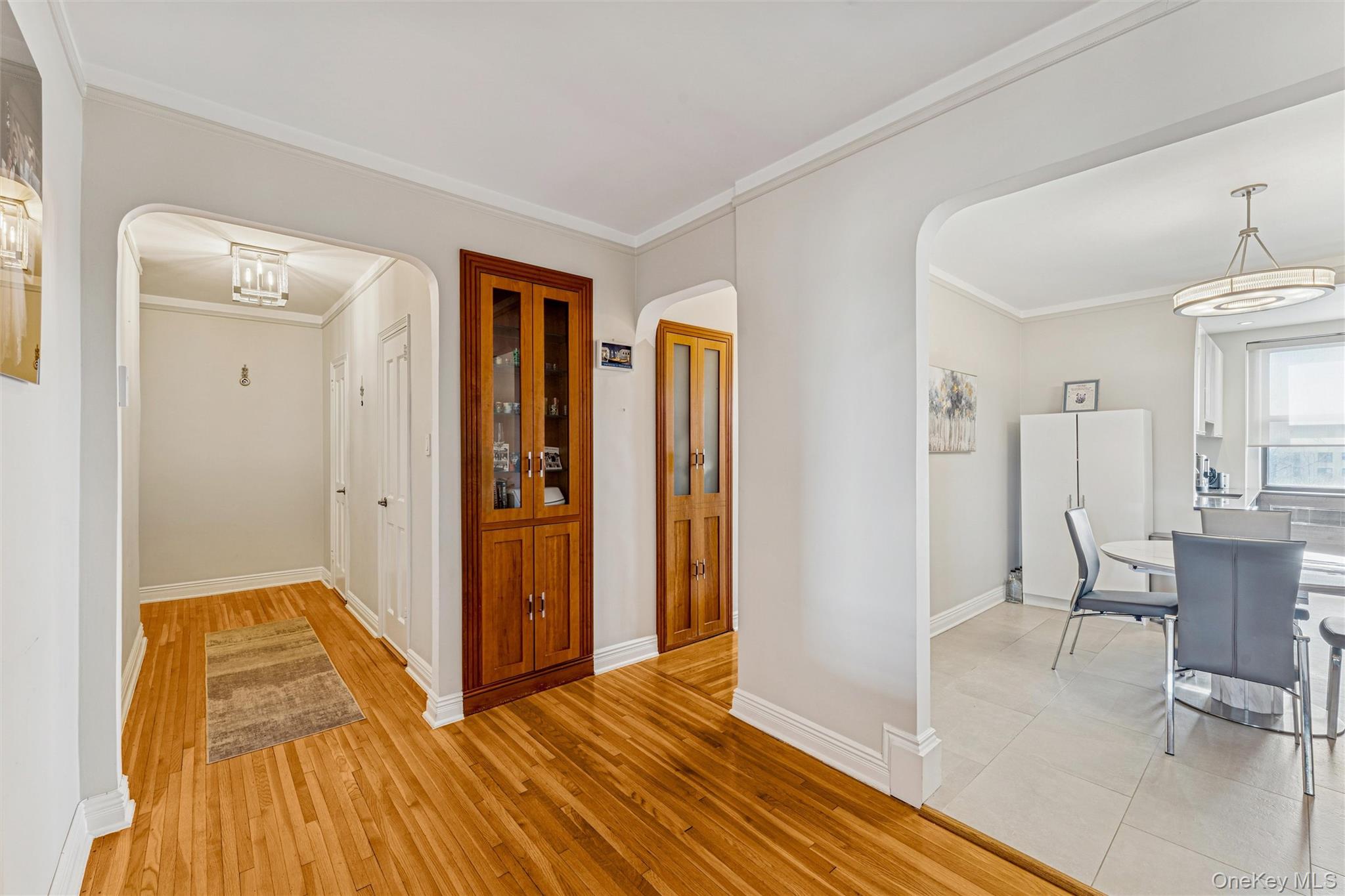 84-51 Beverly Road, Unit 6R Queens, NY 11415 - Photo 12 of 19 a view of a room with wooden floor and furniture
