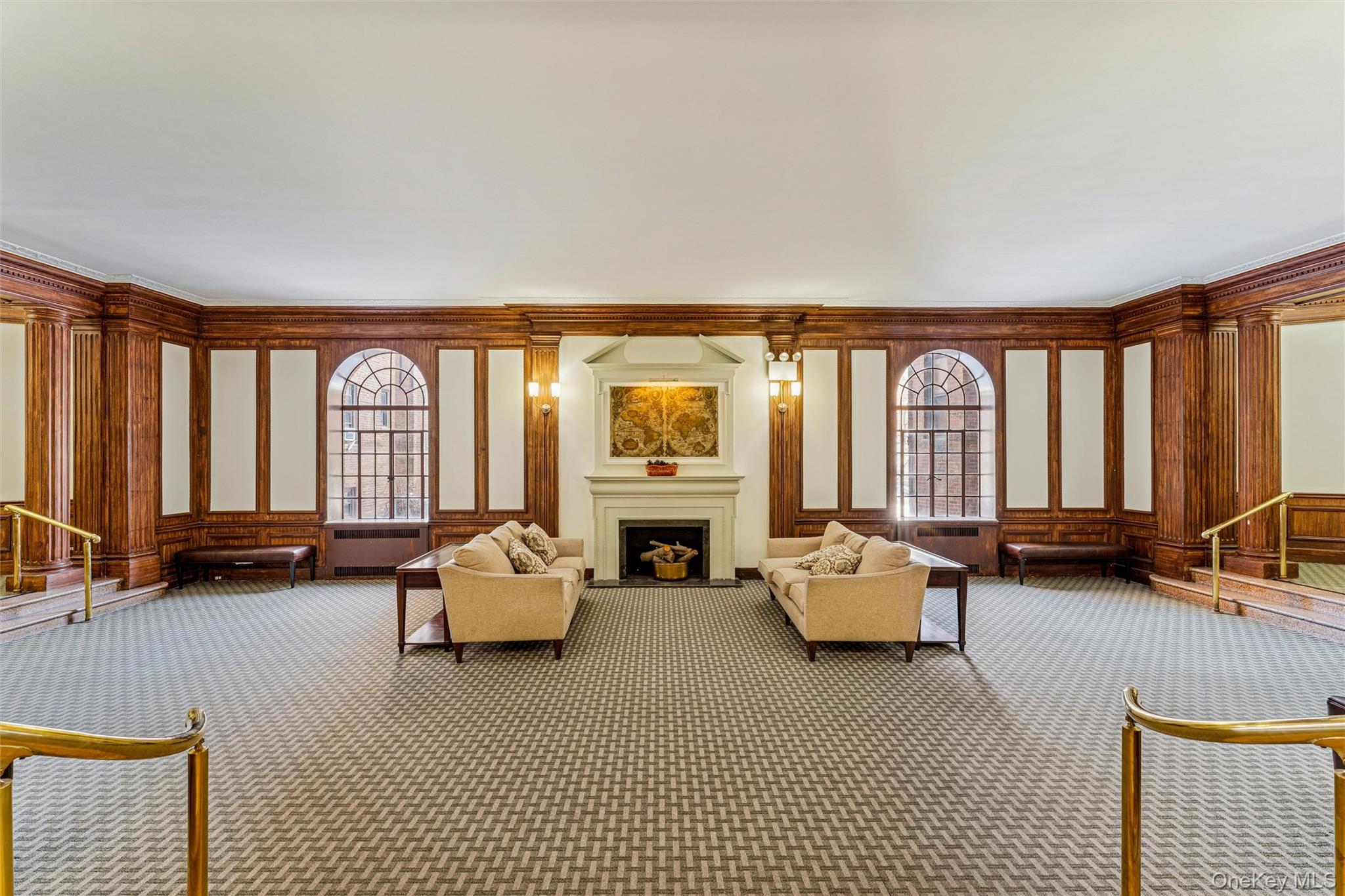 84-51 Beverly Road, Unit 6R Queens, NY 11415 - Photo 16 of 19 a living room with furniture and large windows