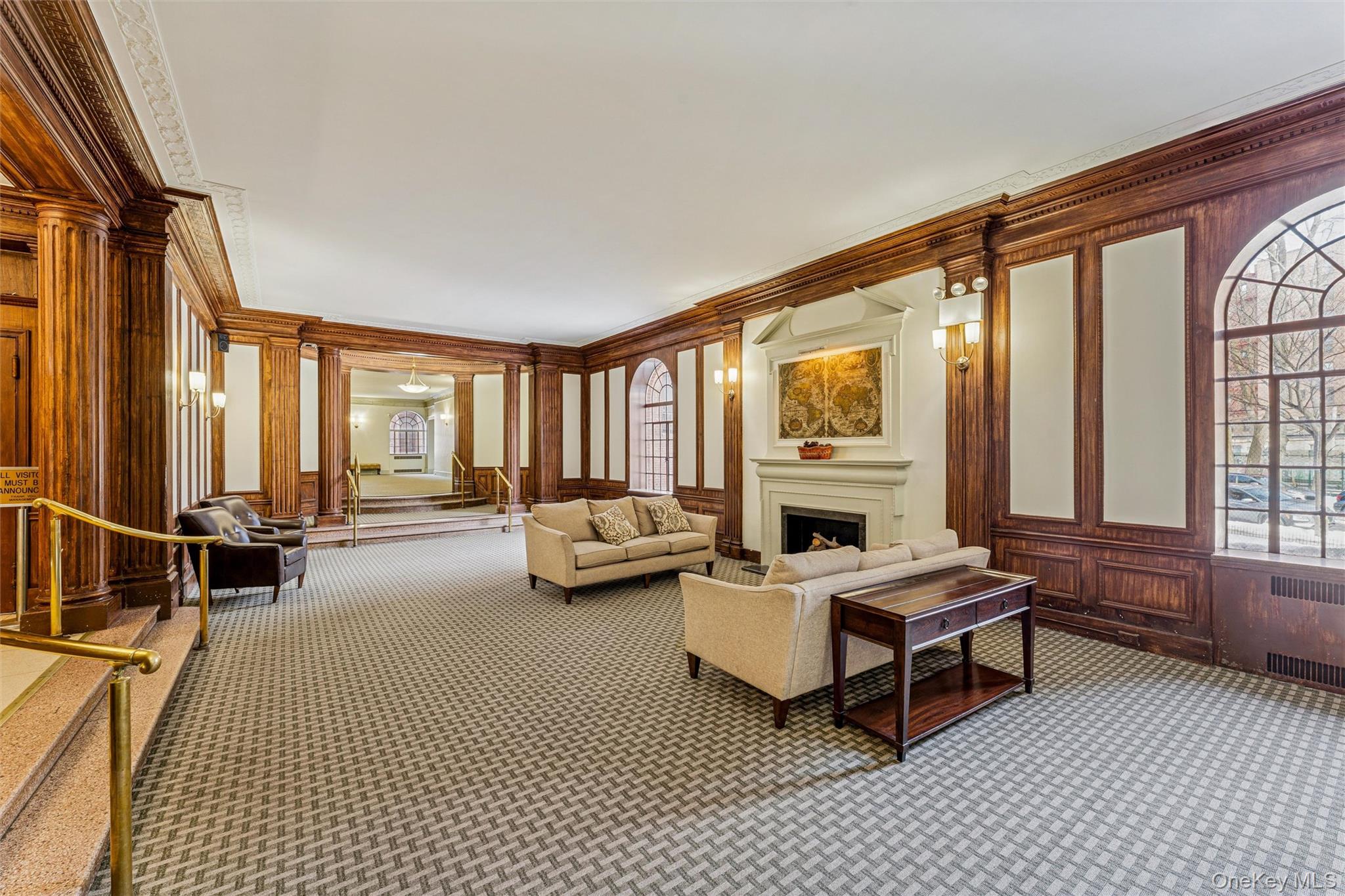 84-51 Beverly Road, Unit 6R Queens, NY 11415 - Photo 17 of 19 a living room with furniture and large windows