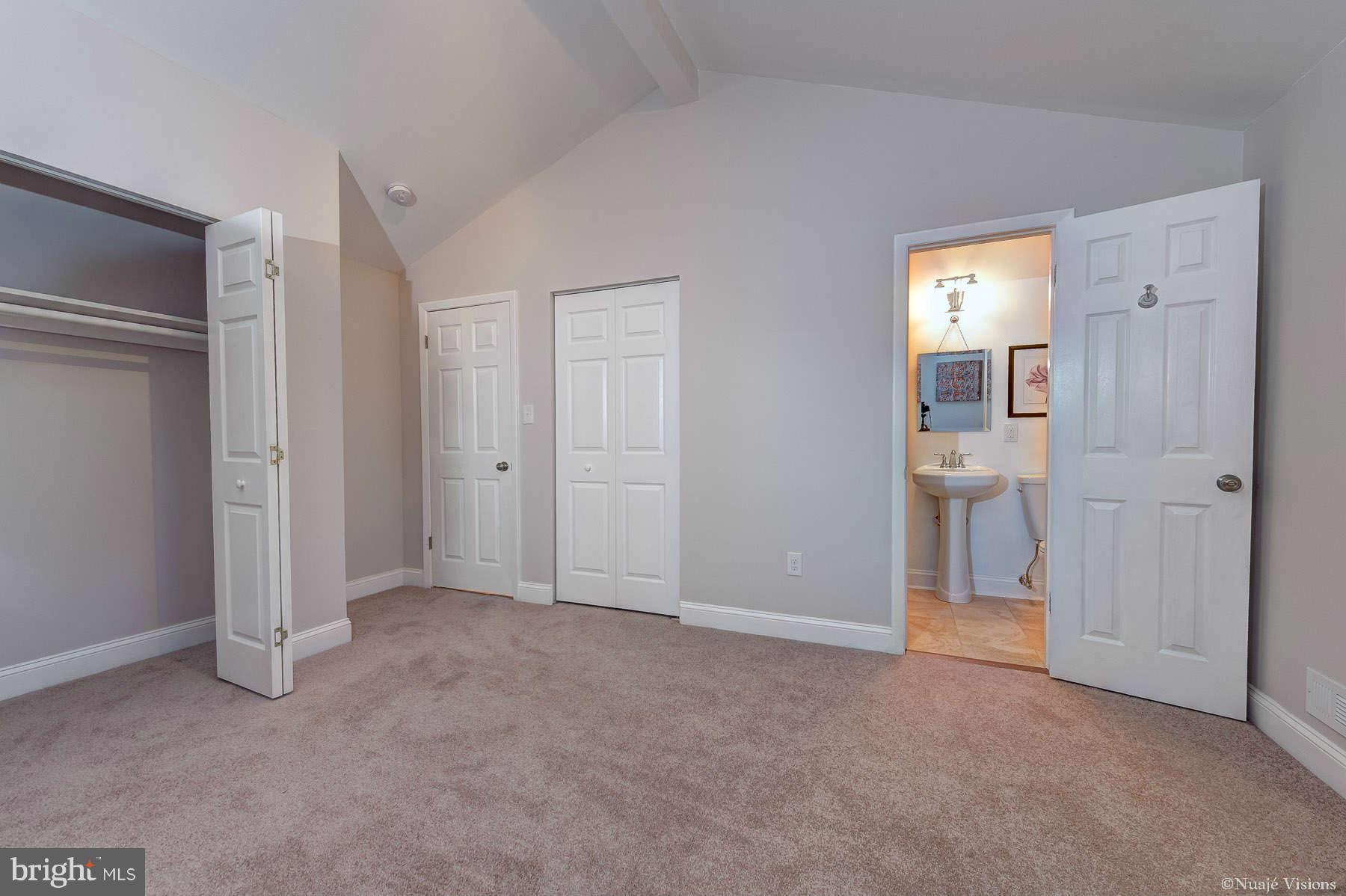 835 Milford Mill Road Baltimore, MD 21208 - Photo 29 of 30 an empty room with closet area