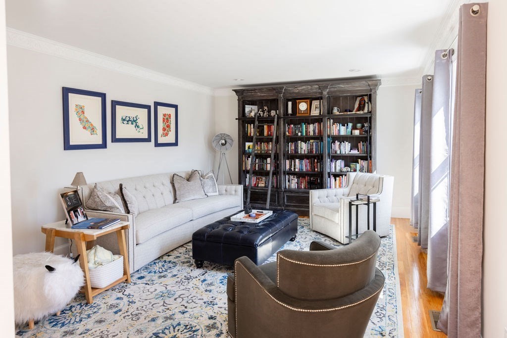 126 Lafayette Street Marblehead, MA 01945 - Photo 5 of 30 a living room with furniture and a book shelf