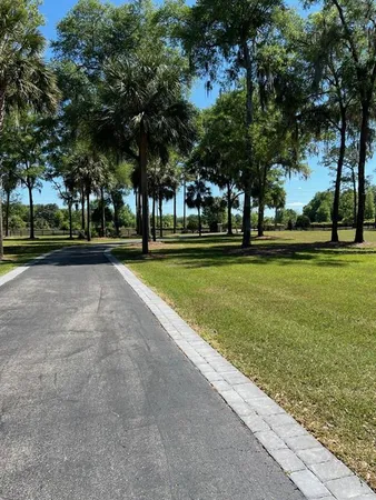 a bedroom with a bed and a television