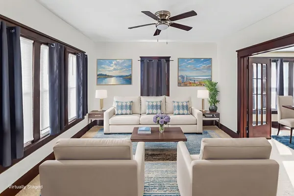 a living room with furniture and a window