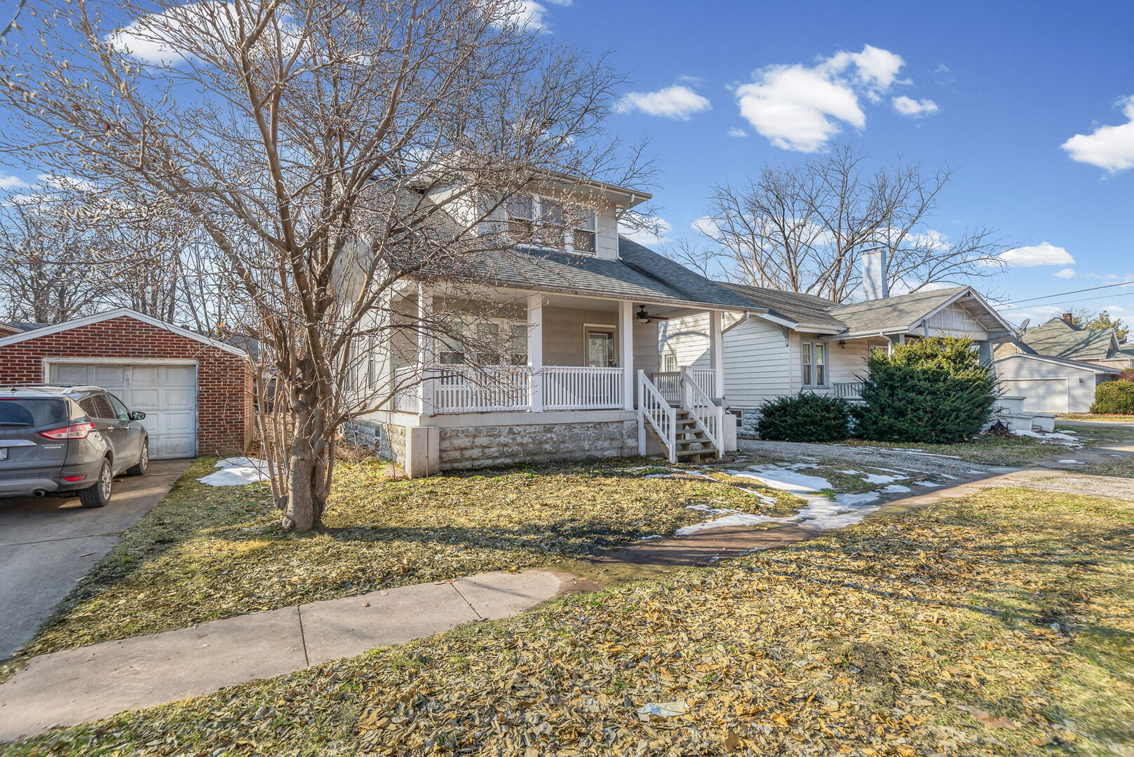 527 East 4th Street Centralia, IL 62801 - Photo 2 of 39 a view of a house with snow on the road