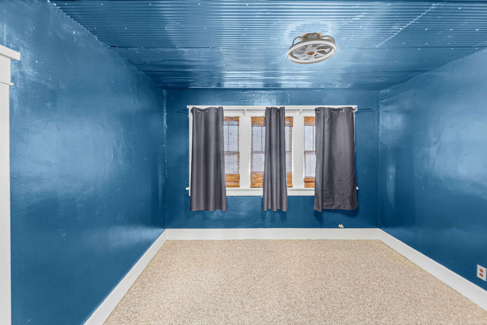 527 East 4th Street Centralia, IL 62801 - Photo 25 of 39 a view of a hallway with wooden walls and floor to ceiling window