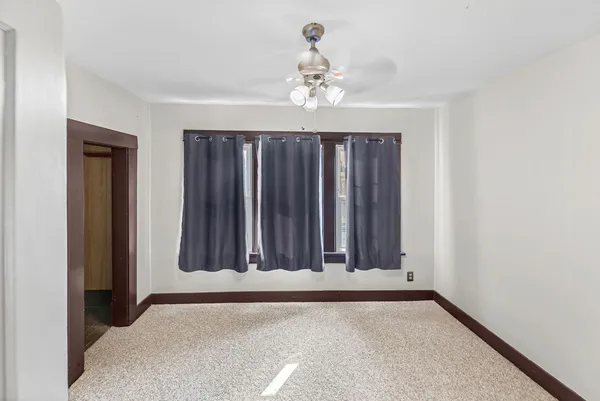 a view of wooden floor and staircase