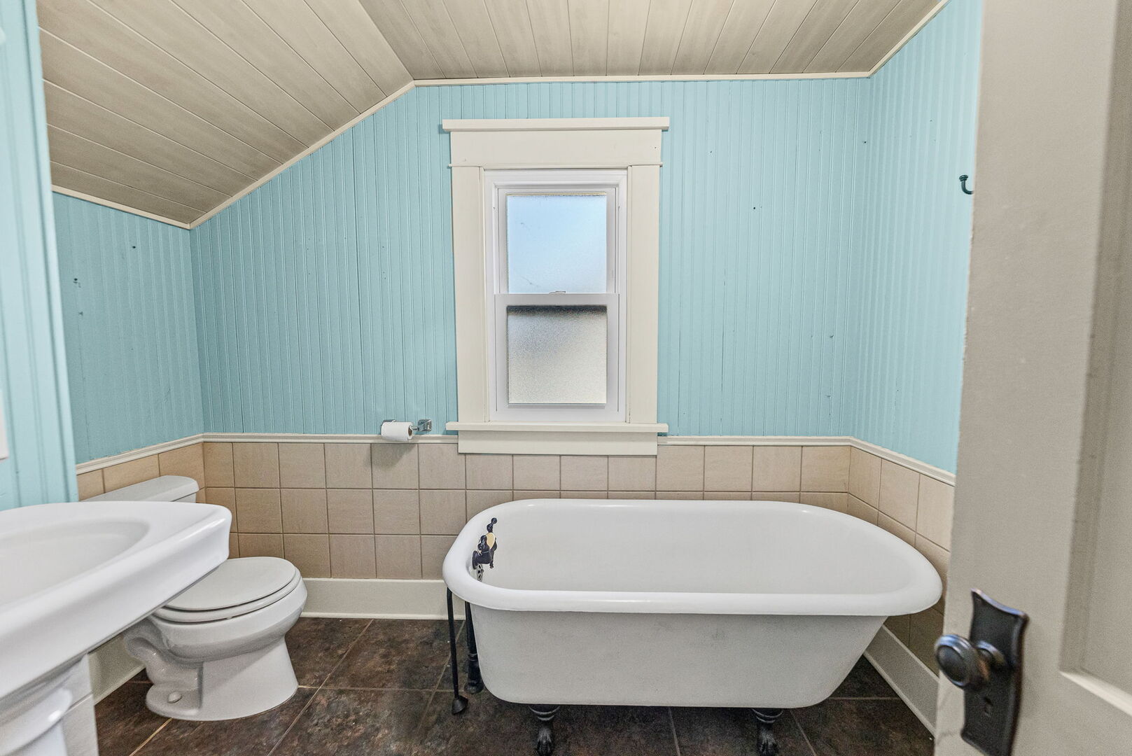 527 East 4th Street Centralia, IL 62801 - Photo 32 of 39 a white bath tub sitting next to a white toilet