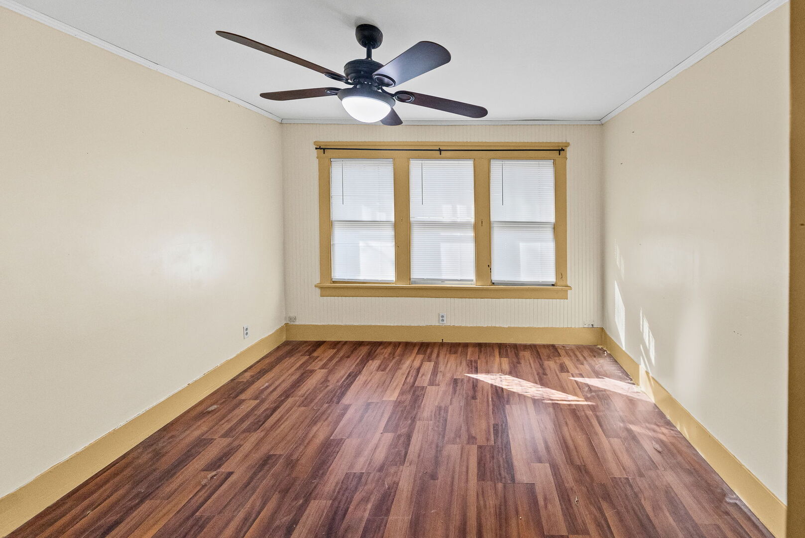 527 East 4th Street Centralia, IL 62801 - Photo 33 of 39 a view of an empty room with wooden floor and a window