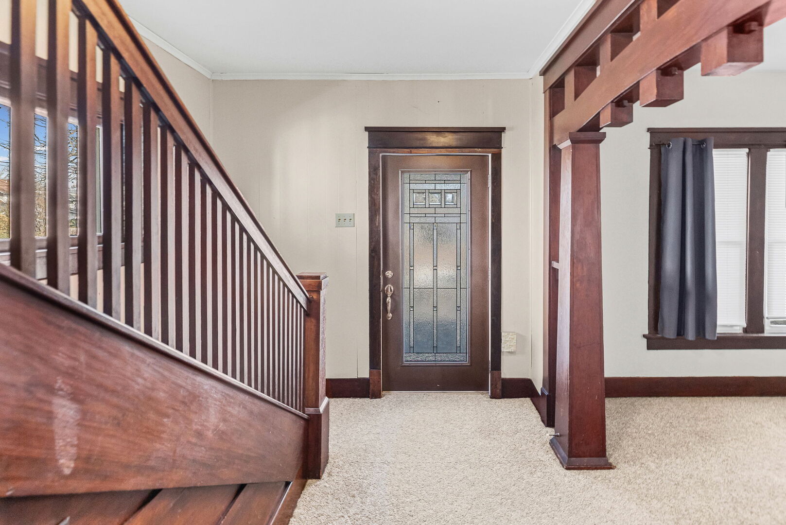 527 East 4th Street Centralia, IL 62801 - Photo 7 of 39 a view of a hallway with wooden floor and staircase