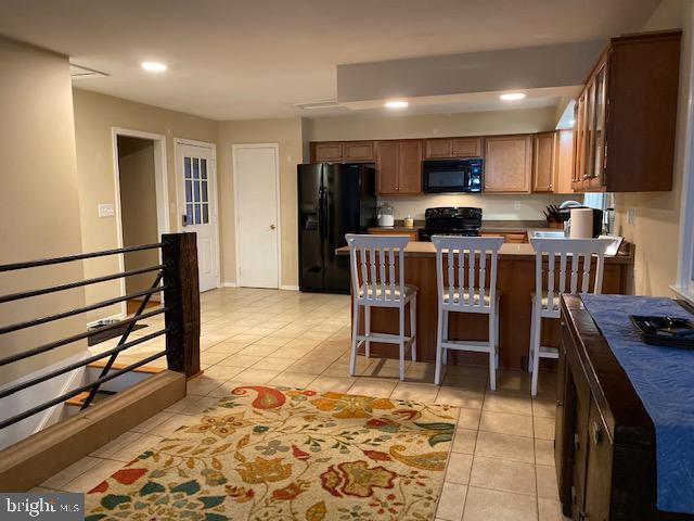 8777 Hunt Trail Warrenton, VA 20187 - Photo 5 of 13 Open space for entertaining and access to fin bsmt