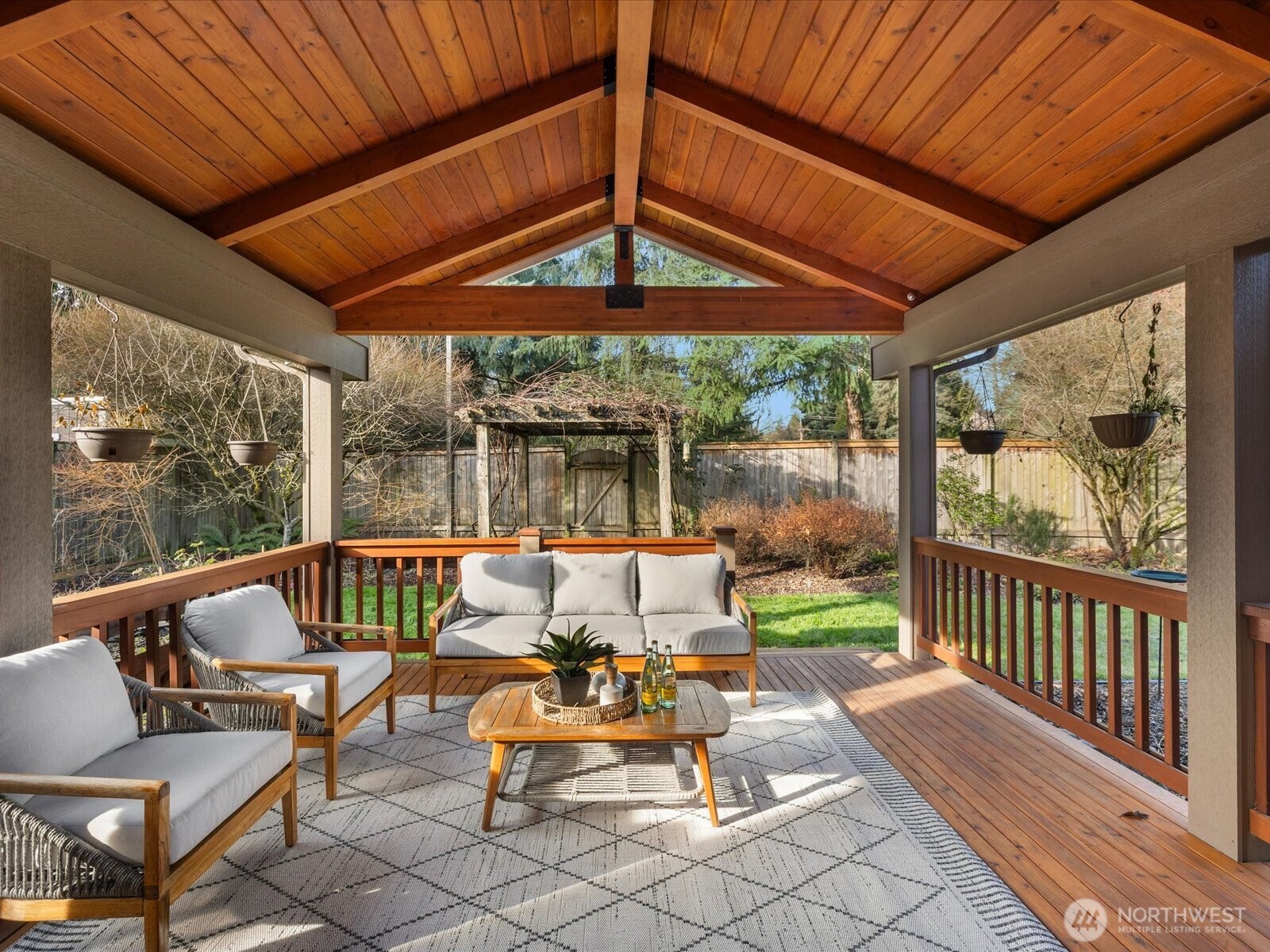 12103 Northeast 168th Place Bothell, WA 98011 - Photo 11 of 36 a patio with glass top table and chairs