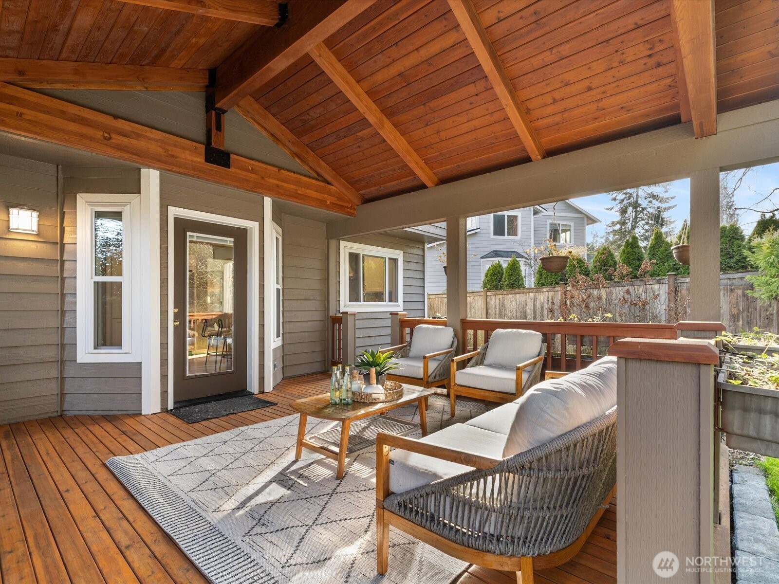 12103 Northeast 168th Place Bothell, WA 98011 - Photo 12 of 36 a balcony with furniture and wooden floor