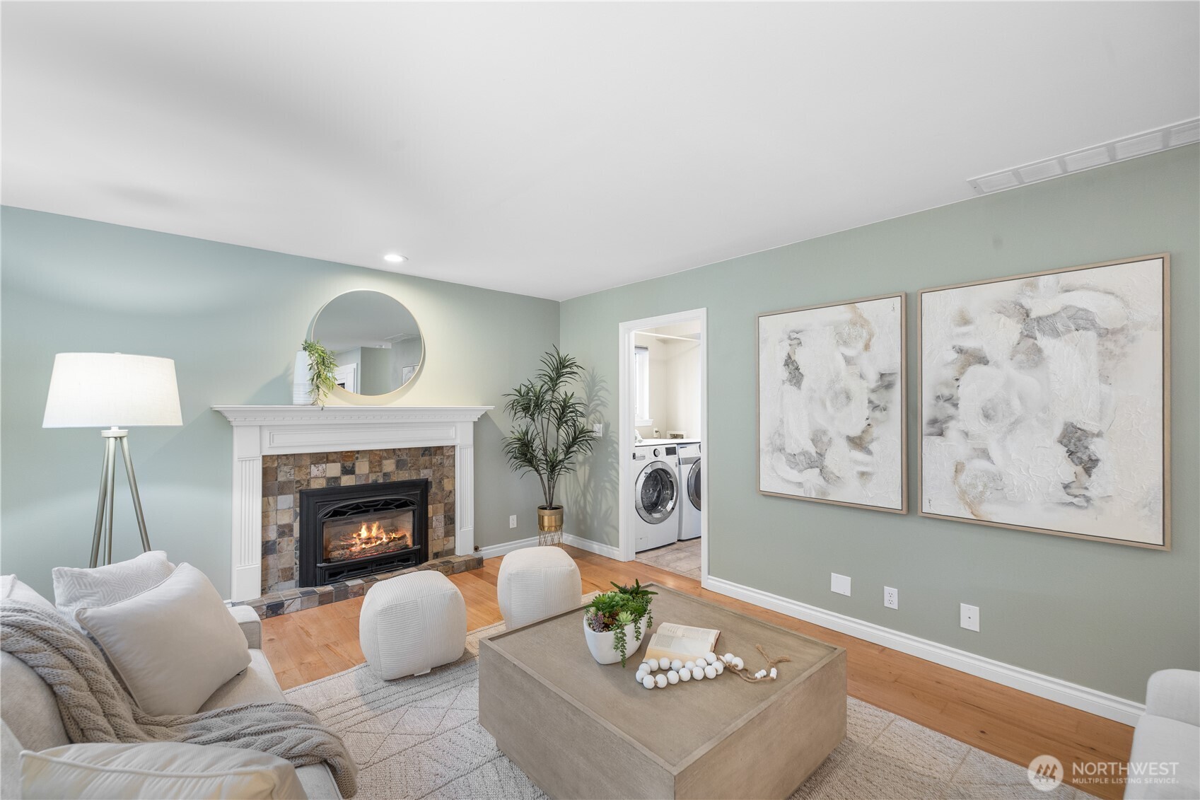 12103 Northeast 168th Place Bothell, WA 98011 - Photo 15 of 36 a living room with furniture and a fireplace