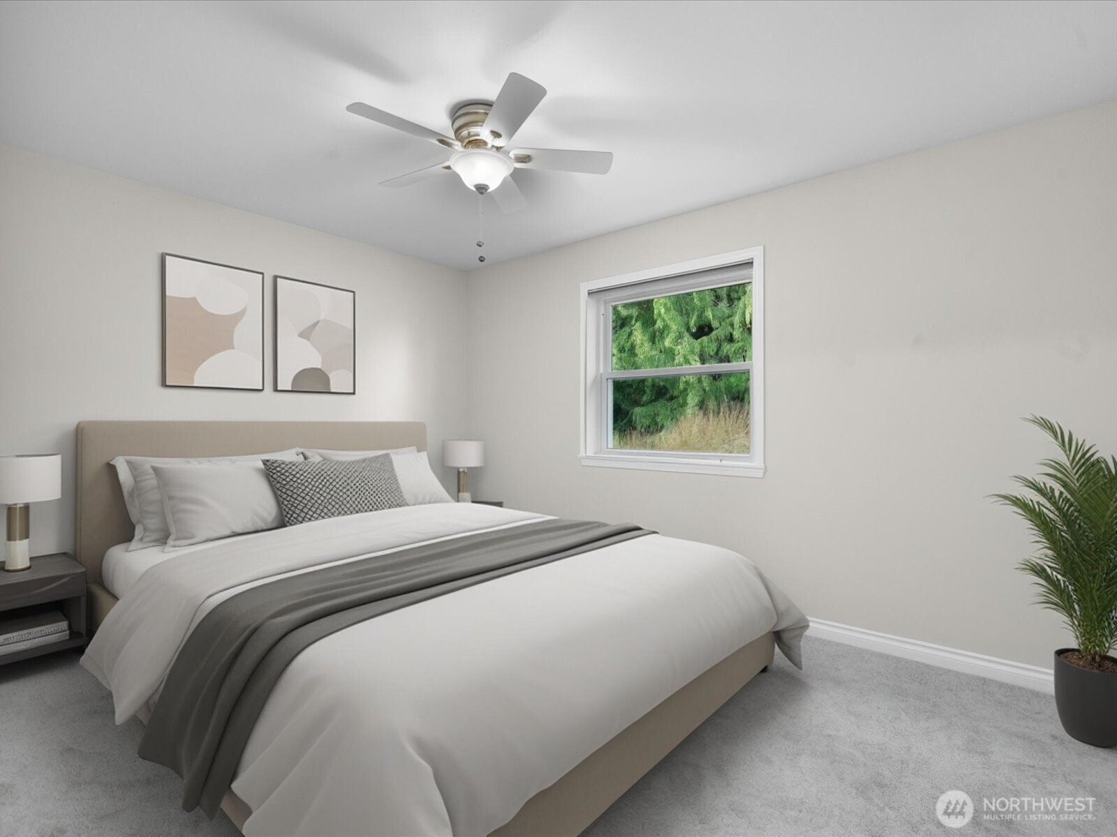 12103 Northeast 168th Place Bothell, WA 98011 - Photo 22 of 36 a bedroom with a bed and a potted plant