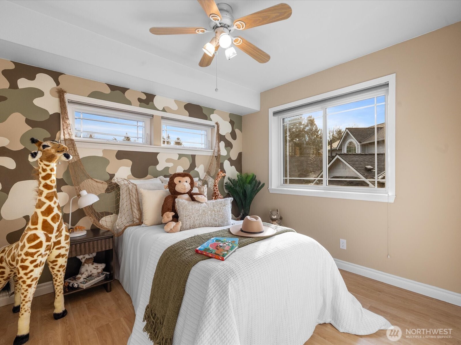 12103 Northeast 168th Place Bothell, WA 98011 - Photo 24 of 36 a bedroom with bed and a window