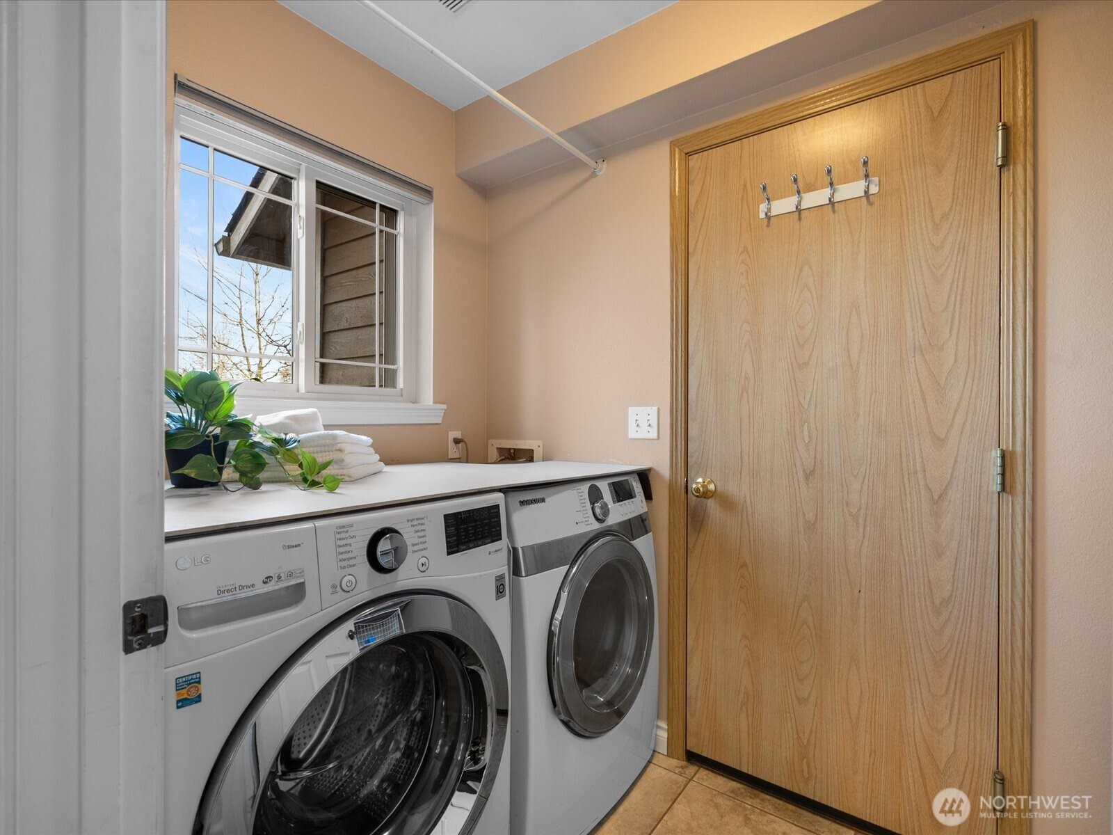 12103 Northeast 168th Place Bothell, WA 98011 - Photo 27 of 36 a view of utility room with washer and dryer
