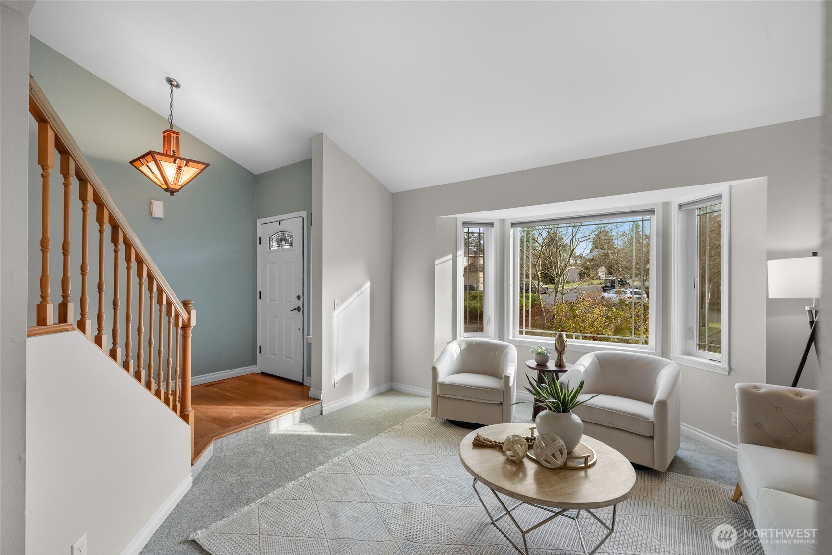 12103 Northeast 168th Place Bothell, WA 98011 - Photo 3 of 36 a living room with furniture and a large window