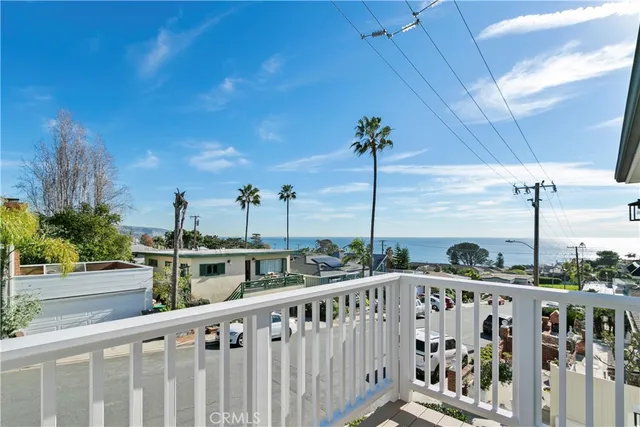 a view of a street with sitting area