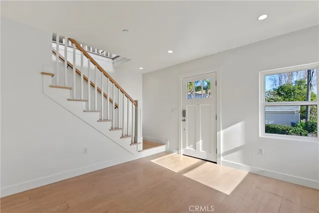 a view of an entryway with stairs