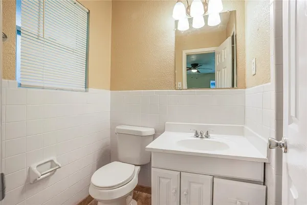 a bathroom with a sink and a toilet