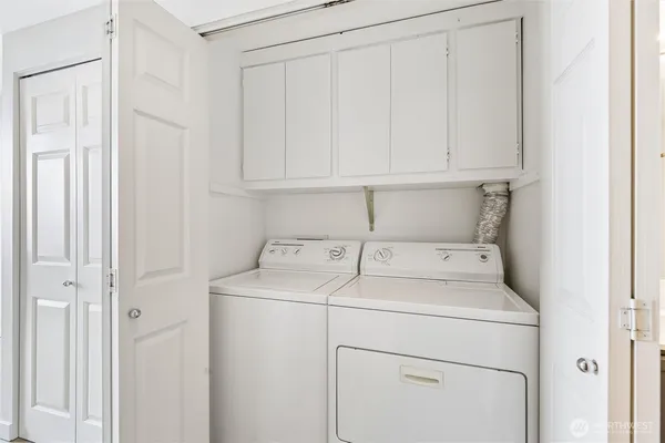 a utility room with dryer and washer