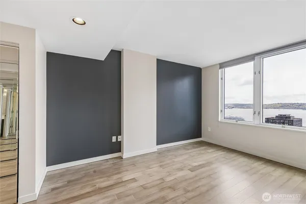 a view of an empty room with a window