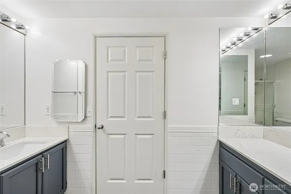 a bathroom with a shower tub and sink