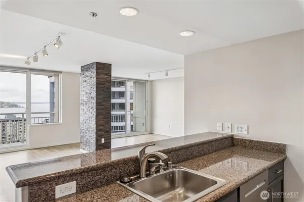 a kitchen with a sink and a window