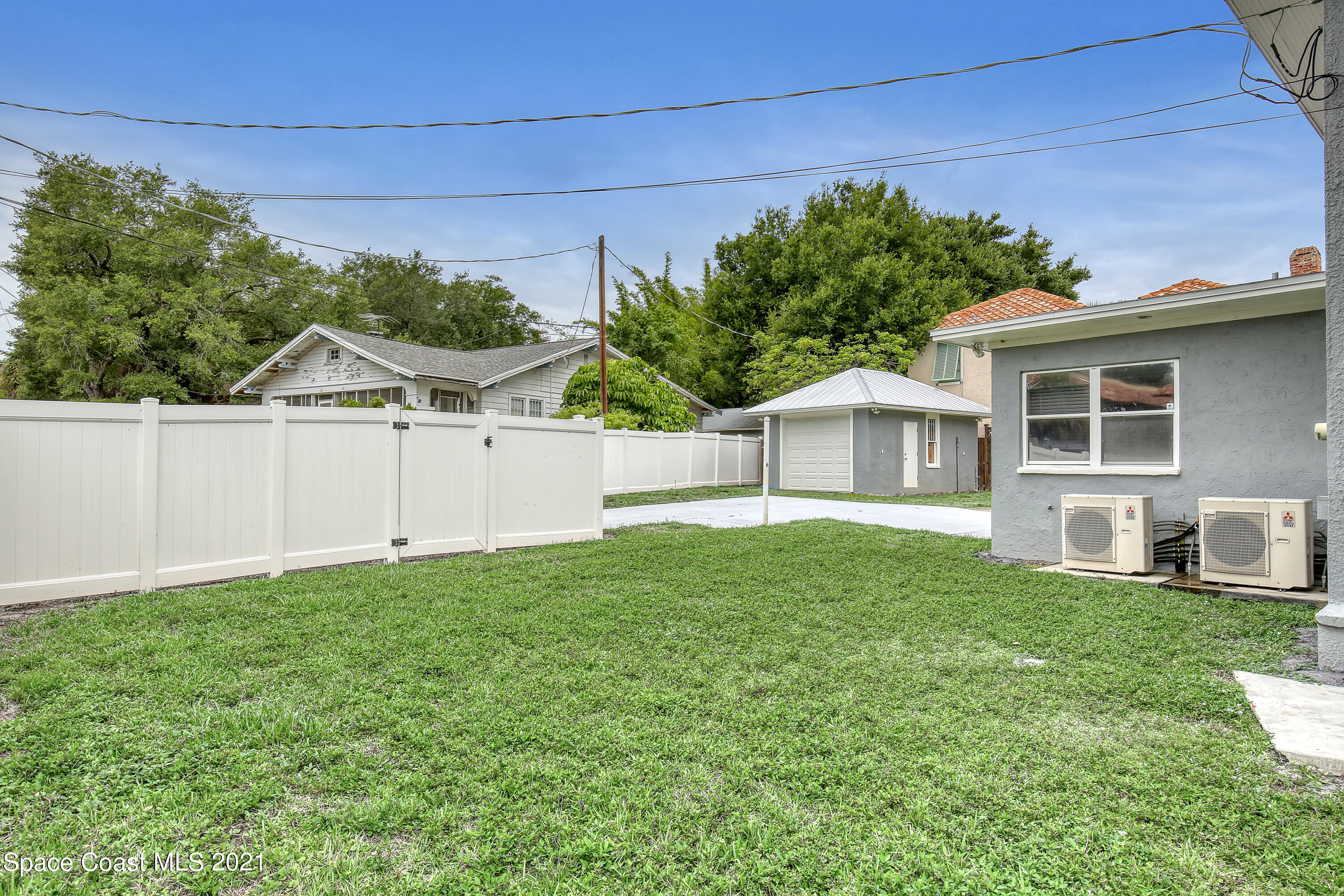117 Riverside Drive Cocoa, FL 32922 - Photo 38 of 38 Backyard with garage