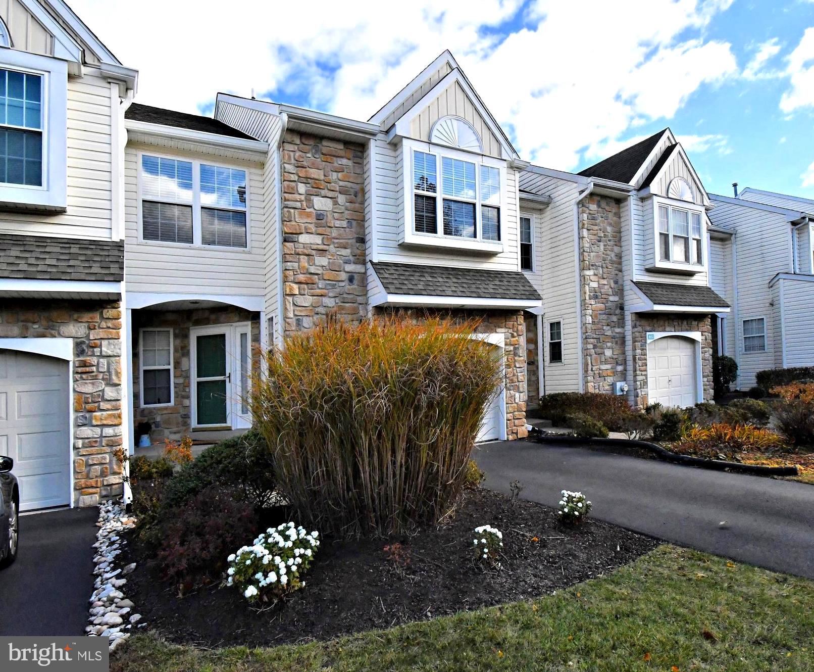 1651 Covington Road Yardley, PA 19067 - Photo 2 of 59 a front view of a house with a yard and outdoor seating