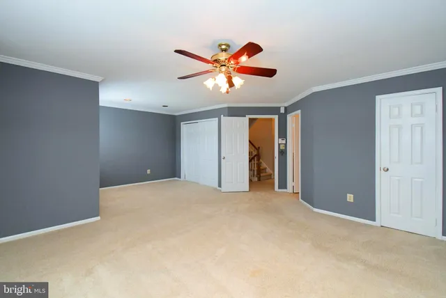 a spacious bathroom with a shower sink mirror and
