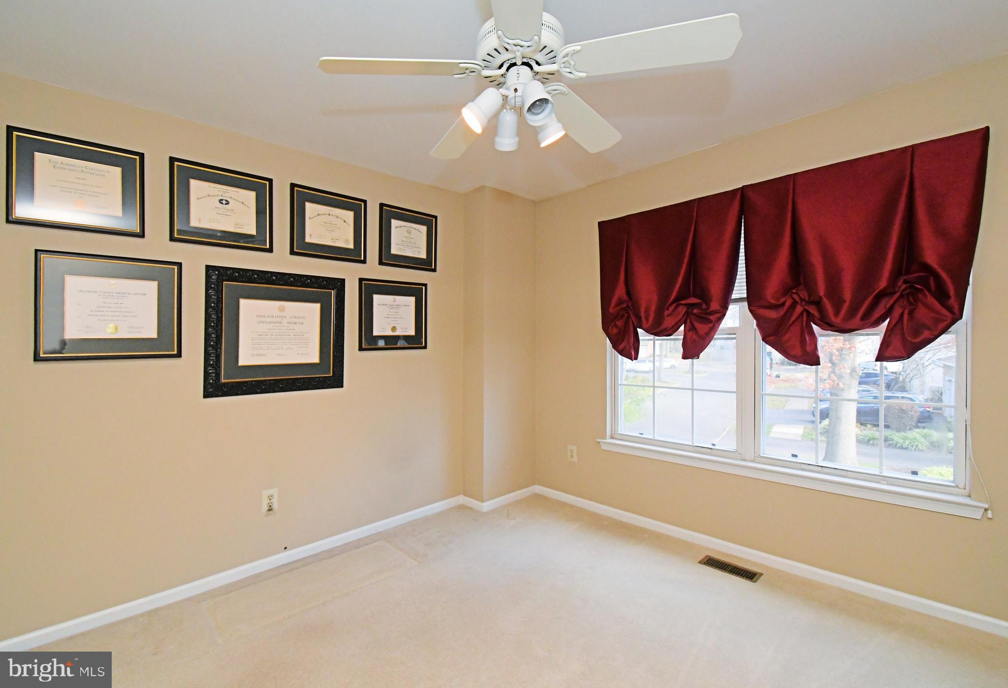 1651 Covington Road Yardley, PA 19067 - Photo 38 of 59 a view of a livingroom with wooden floor and windows