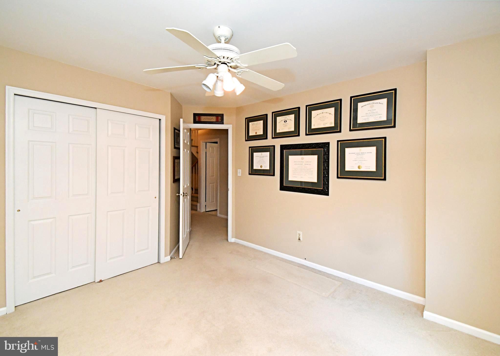 1651 Covington Road Yardley, PA 19067 - Photo 42 of 59 a view of a livingroom with a ceiling fan