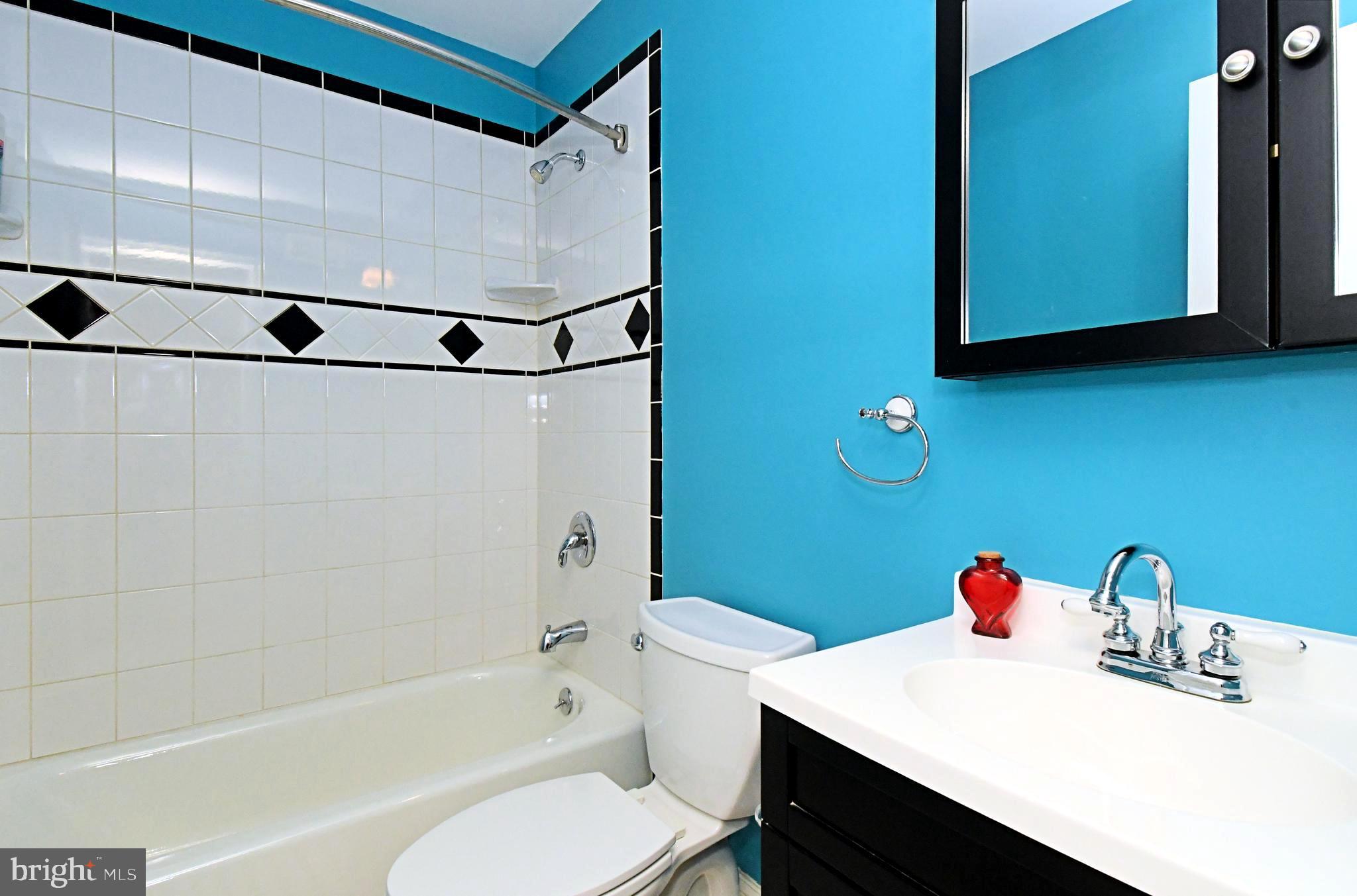 1651 Covington Road Yardley, PA 19067 - Photo 43 of 59 a bathroom with a sink a toilet and a bathtub