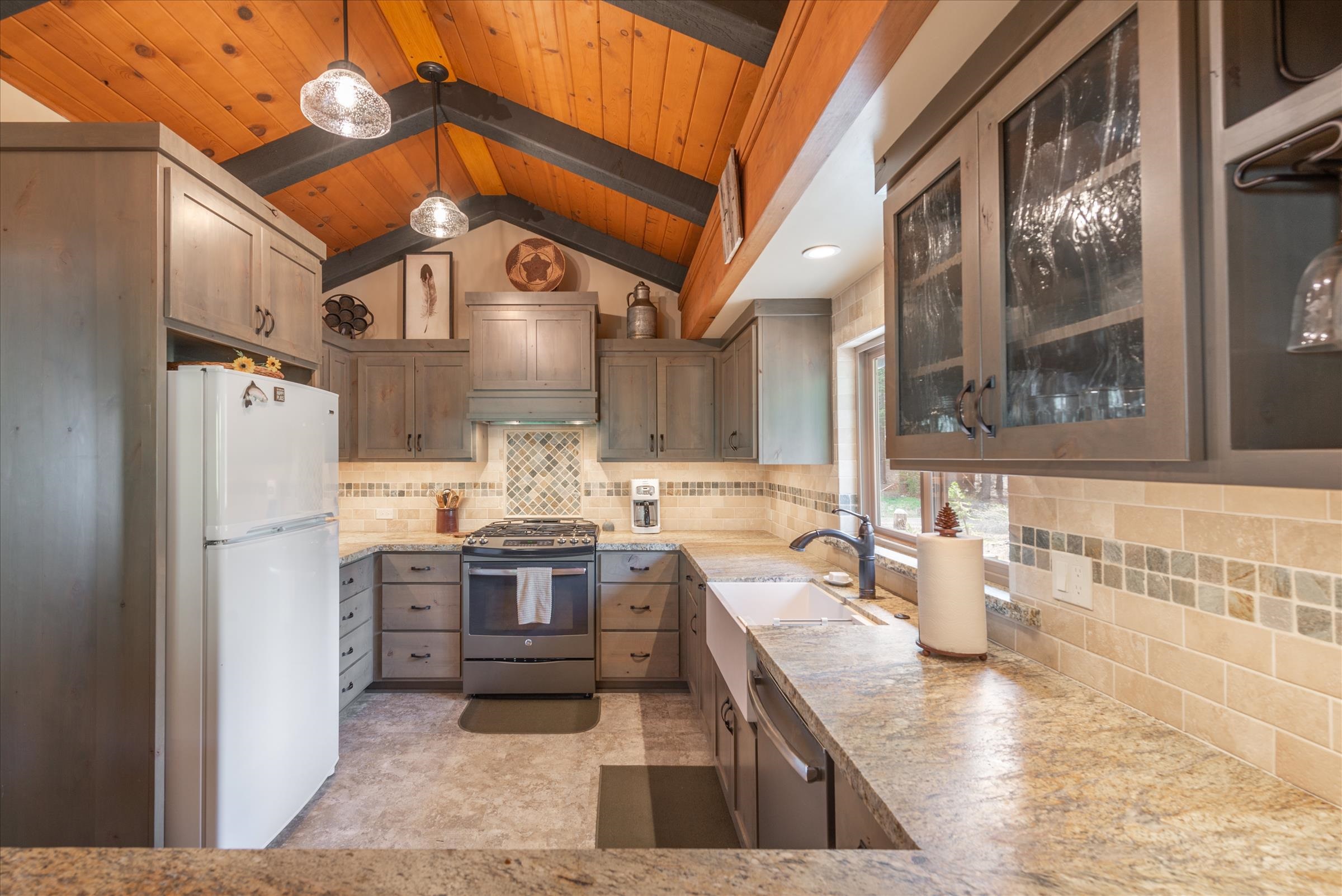 6860 River Road Truckee, CA 96161 - Photo 11 of 21 a kitchen with refrigerator and cabinets