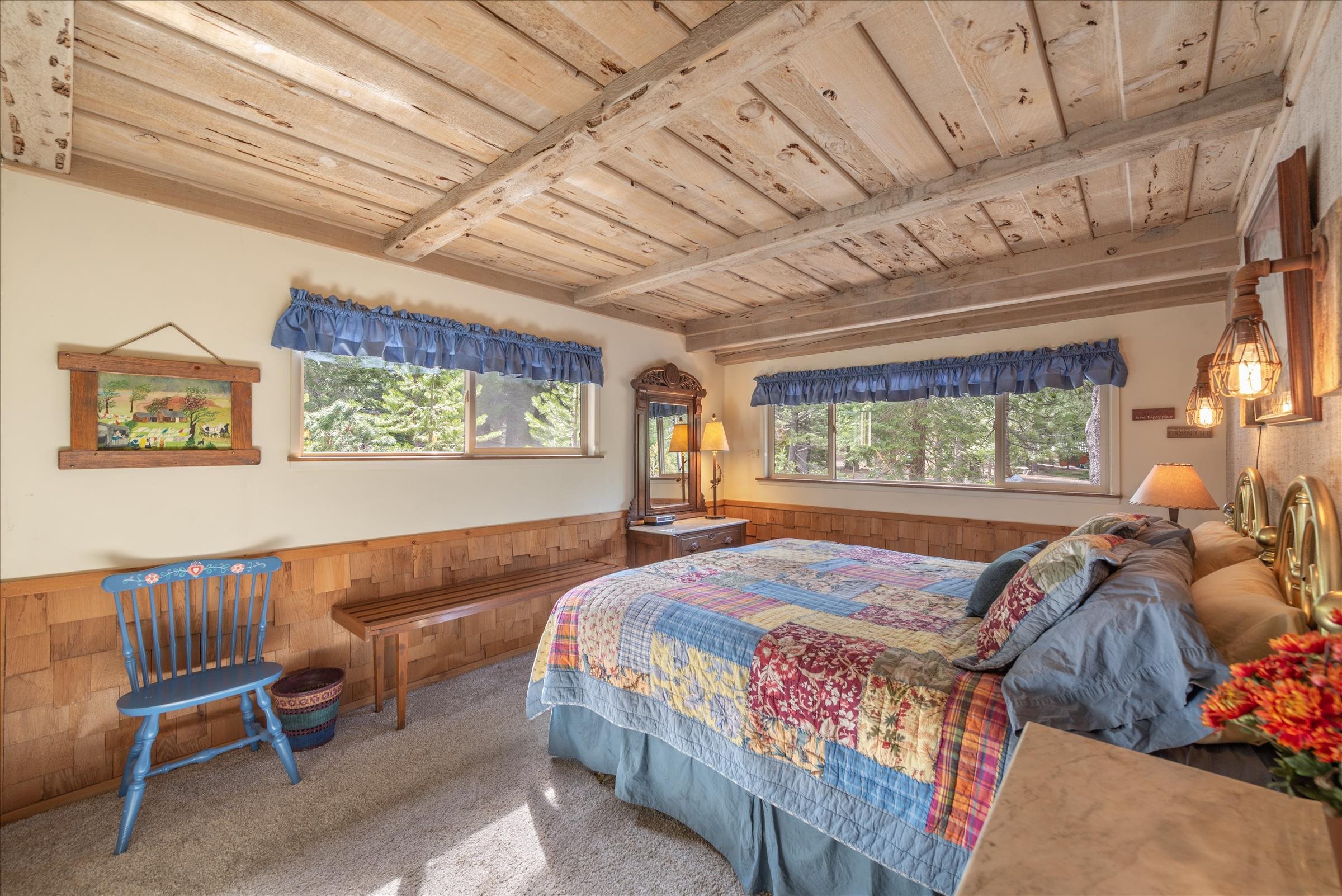 6860 River Road Truckee, CA 96161 - Photo 12 of 21 a bedroom with a bed and a window